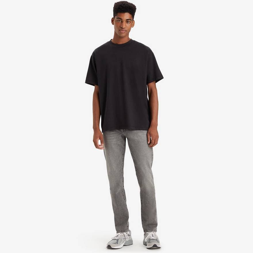 502™ TAPERED JEANS