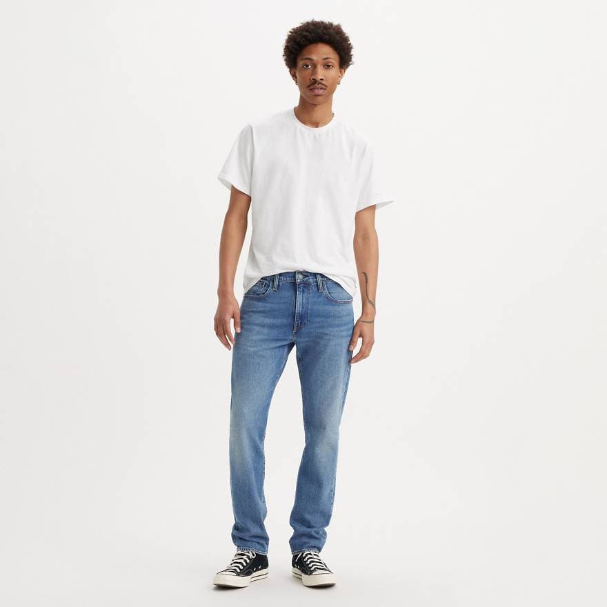 502™ TAPERED JEANS