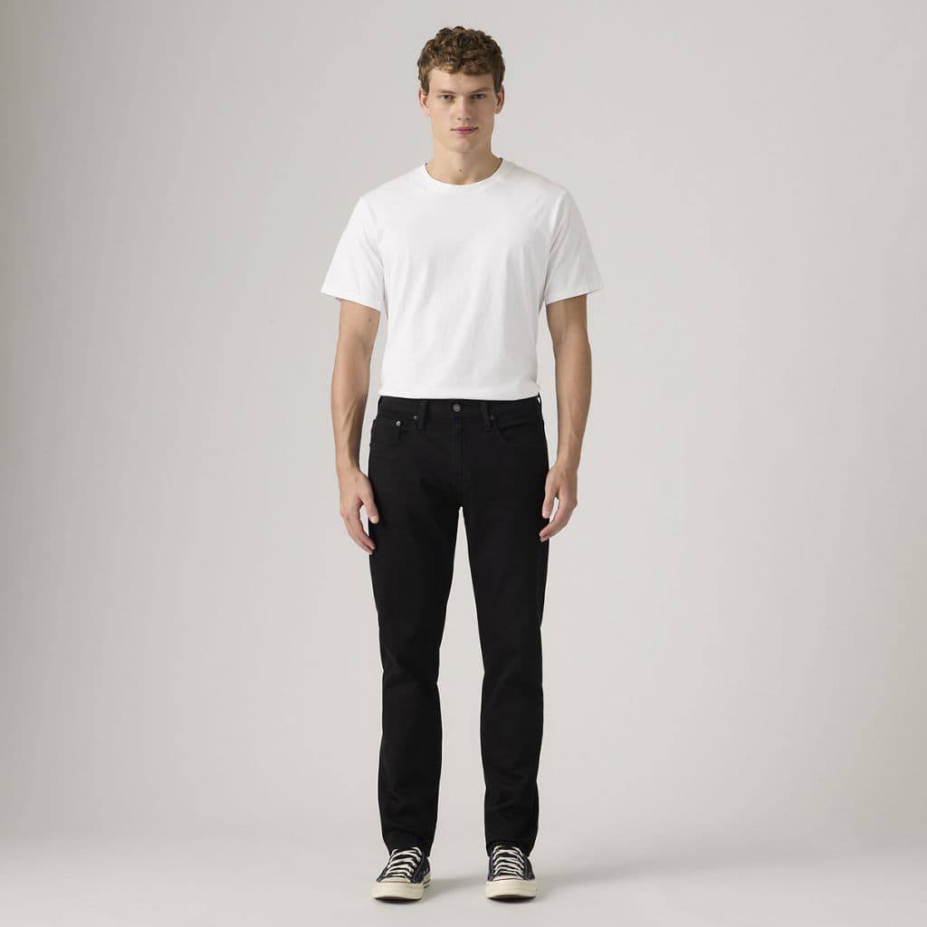 502™ TAPERED JEANS