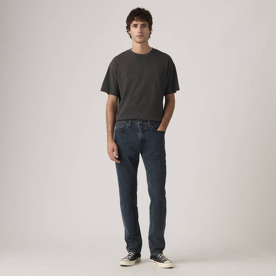 502™ TAPERED JEANS